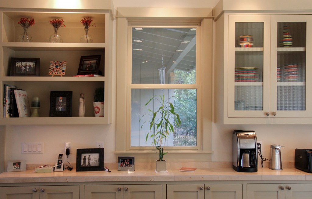 Kitchen Cabinets - Open shelves and glass cabinets doors provide contemporary storage.