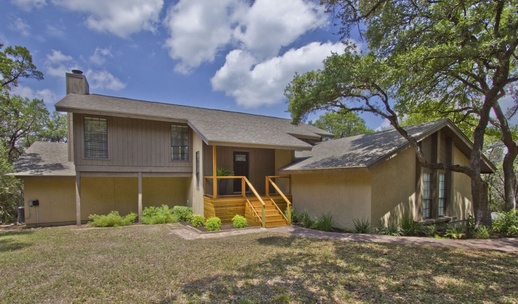Rustic contemporary home in West Lake Hills, Tx. Front view on acre lot.