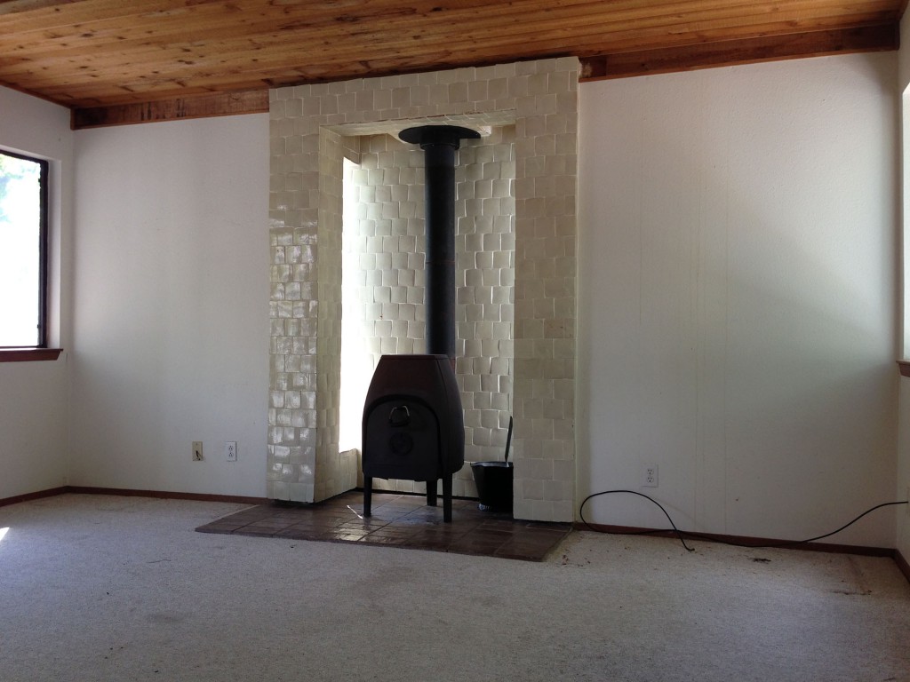 View of old Jotul stove in family room of Tarrytown home. 