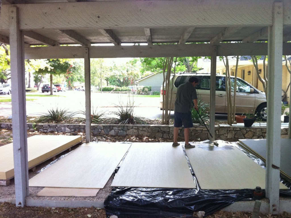 Painting Hardie Board Siding in the Carport before installation