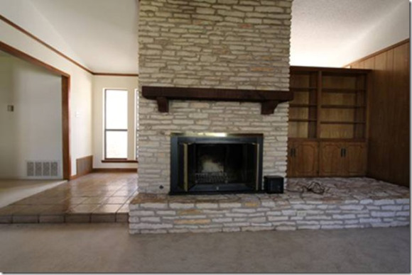 Ranch style home before remodel - view of Living and fireplace.