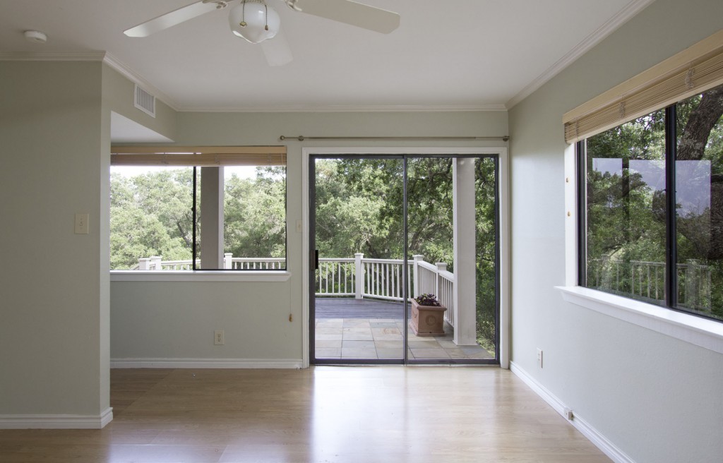 Second bedroom is on lower level. Glass doors and windows open to the native landscaping of the Westlake area.