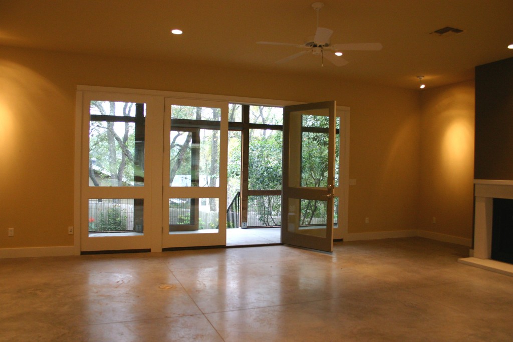 Double glass doors open to screened porch.