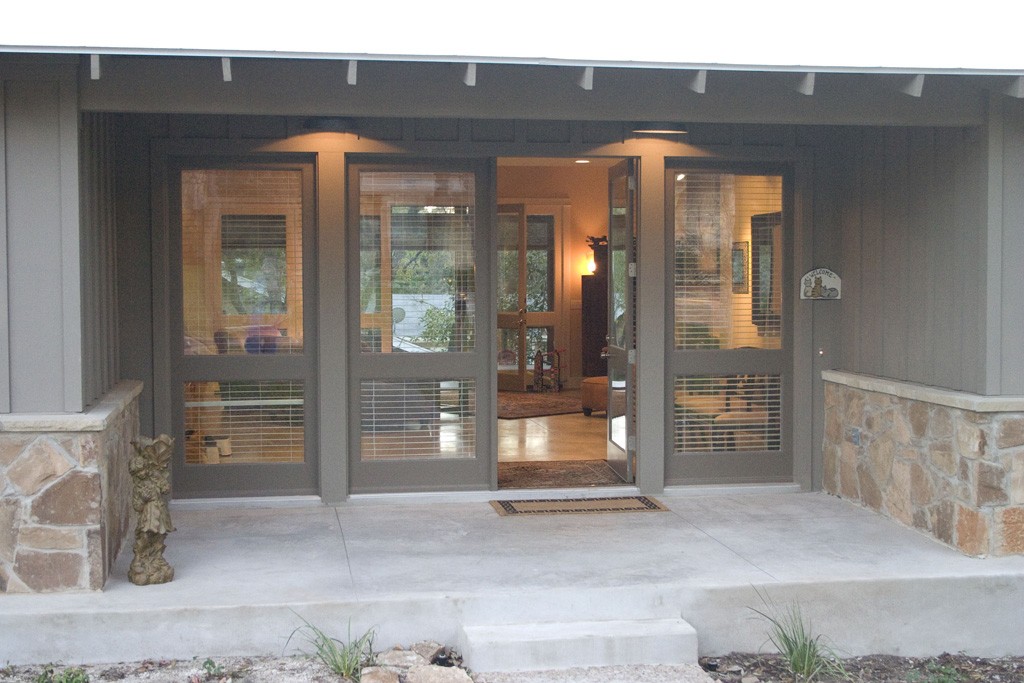 Our design build Austin projects. Glass front doors of modern ranch.