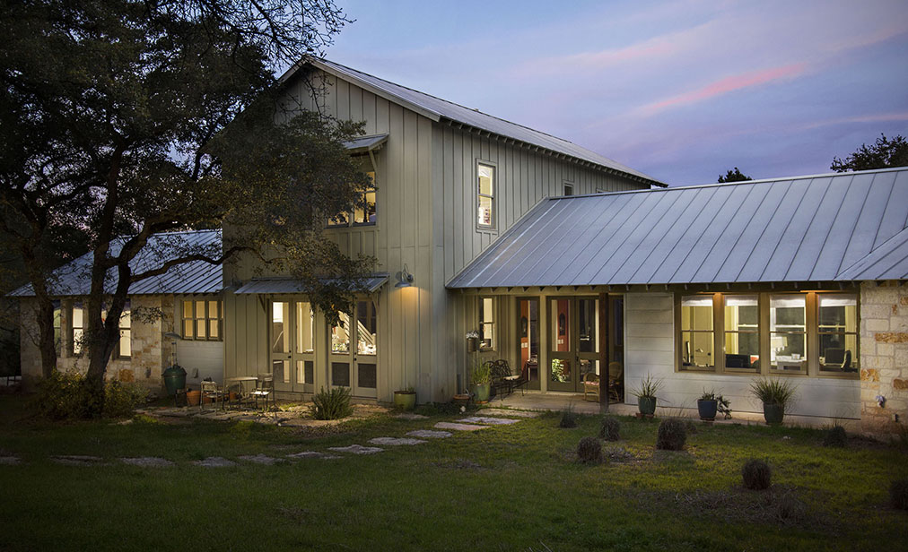 Matt Hejl's Real Estate Photography Austin - Evening view of Modern Westlake farmhouse.
