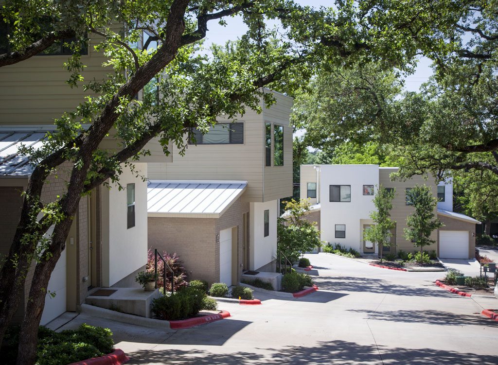 View of Cardinal Lane Condos nestled under Oaks in popular Central South Austin.