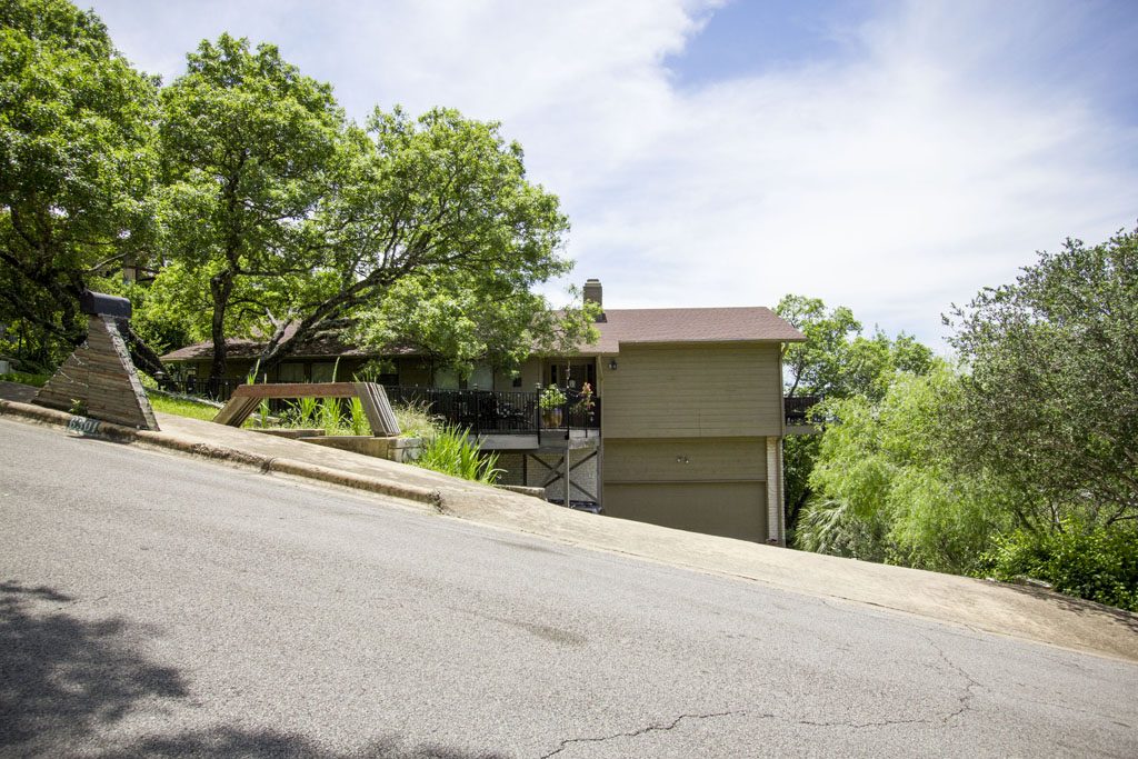 A lovely home in Lost Creek neighborhood on a steep slope.