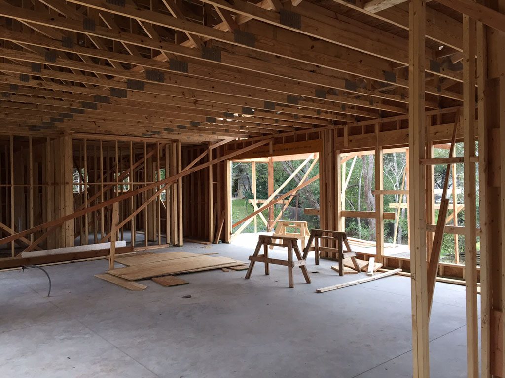 Austin building permits - Find out what you need. This shows a home in framing stage of construction. 