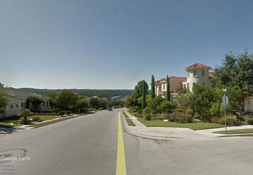 real estate market suburban northwest Austin. View of street scene in River Place neighborhood.